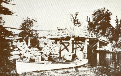 A Motorboat At The Pond Road - Cobbossee Stream Bridge